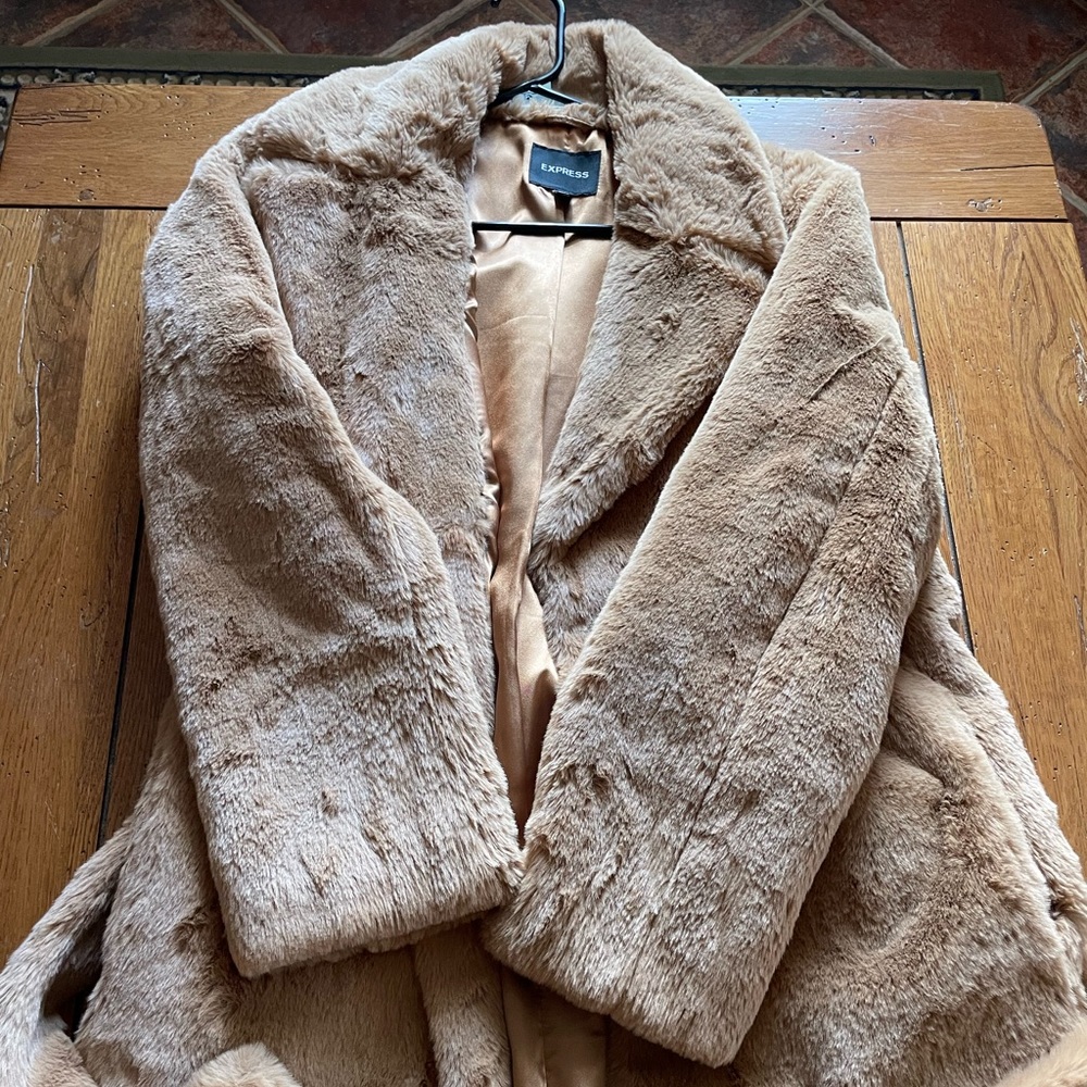 Express super soft coat. Worn once  Tan / inside gold .  Size medium